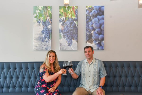 owners Alayna Brewer and Jamie Umberger in southern vibes tasting room and wine cellar
