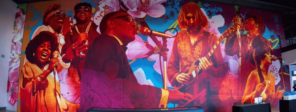 Local Muralist Steven Teller Earns National Recognition for Psychedelic Tribute to Georgia Music Legends