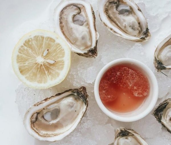 Raw oysters on the half shell with granita mignonette from Culinary Outfitters